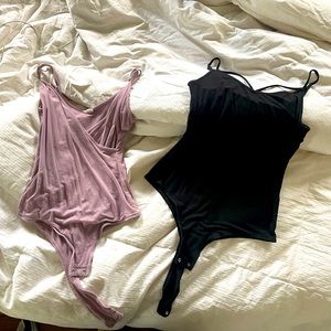 set of two garage bodysuits